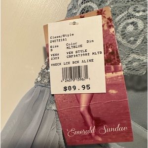 Size small blue/gray formal dress. Never worn. Not altered.